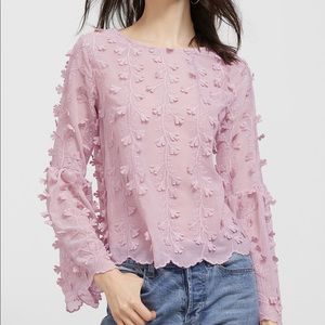 Beautiful pink blouse with 3D flowers.  Brand new.